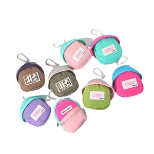 Mini backpack keychain coin purses with carabiners in various candy colors and patches