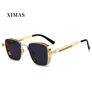 Detail of steampunk square sunglasses with gold metal frame and side shield panels