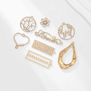 Set of 8 KC gold alloy DIY pendants including flower and heart shapes for jewelry making