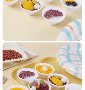 Detailed view of 5cm miniature resin dessert bowls featuring assorted fruit and pudding models
