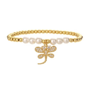 Minimalist gold beaded bracelet featuring white pearls and a zircon dragonfly pendant