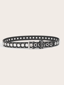 Close-up of black punk style leather belt with silver square buckle and double eyelets