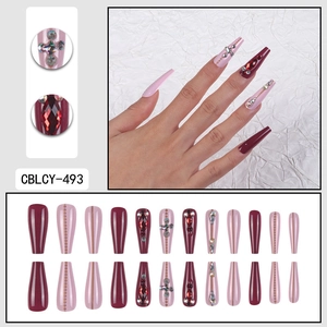 Long coffin press-on nails in pink and burgundy with rhinestones and cross charms