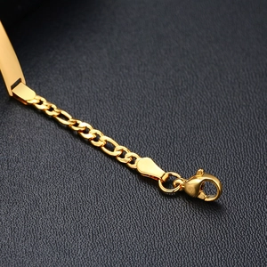 Macro shot of gold lobster clasp and adjustable extension chain on kid's bracelet