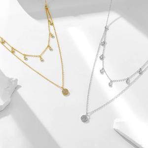 Double-layered 925 sterling silver necklace with zircon disc pendants in gold and silver
