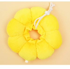 Detail of soft sunflower yellow pet cone with adjustable white drawstring and plush texture