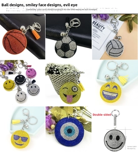 Macro shot of rhinestone crystal baseball keychains with colorful tassel and bell