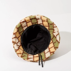 Thick checkered fleece bucket hat in retro beige and green with adjustable inner drawstring