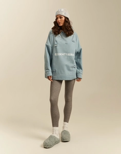 Light blue oversized hoodie with distressed hole details and text print for women