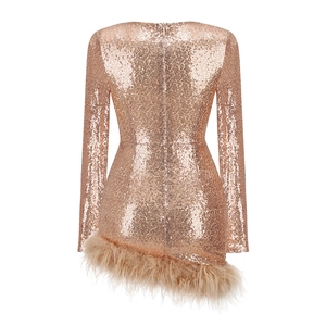 Close-up of rose gold sequins and ostrich feather trim on this elegant party dress