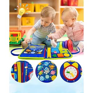 Detail of Montessori felt busy board showing clock, calendar, and zipper for toddler skill learning