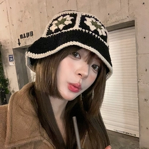 Handmade crochet bucket hat with floral pattern for women in chic knit design