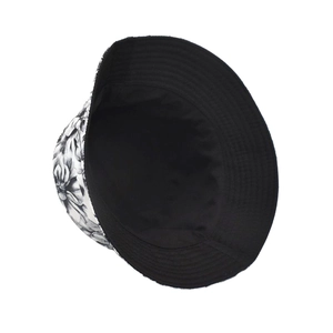 Detail of floral print bucket hat with wide brim and contrasting black reversible lining