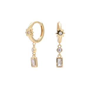 Detail of gold star earrings with sparkling cubic zirconia charms on white background