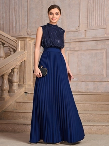 Detail of navy blue sleeveless maxi dress with sequin bodice and pleated chiffon skirt