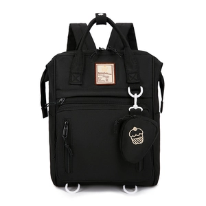 Waterproof multi-functional black diaper backpack with a cupcake charm and large capacity