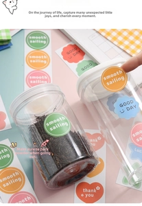 Close-up of waterproof macaron-colored labels with smooth sailing and good day phrases