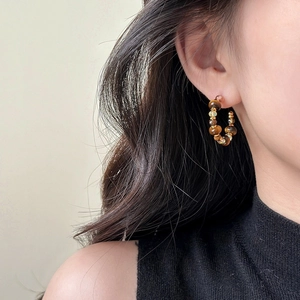16K gold plated tiger eye stone C-shaped beaded hoop earrings on female model