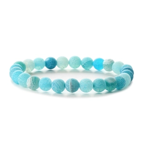 Handmade blue weathered agate beaded bracelet with natural stone texture on white background
