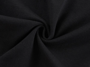 Close-up of soft black breathable cotton knit fabric texture for slim fit sports t-shirt