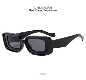 Side view of trendy black rectangular sunglasses with dark grey lenses and thick frames