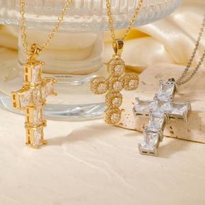 Luxury hip hop cross pendant necklaces in gold and silver with cubic zirconia stones