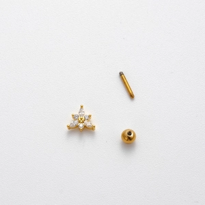 Three-piece gold flower ear stud showing screw-back design and white zircon details