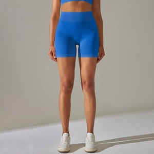 Front view of seamless high-waist royal blue fitness shorts showing peach lift effect