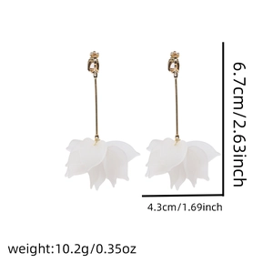 Detail view of white layered petal earrings with gold hooks showing dimensions 6.7x4.3cm