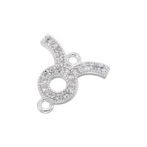 Macro shot of silver connector pendant with micro-pave white zircon crystals