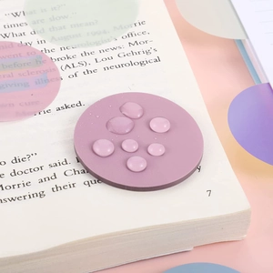 Purple round transparent sticky notes with waterproof PET material on book page