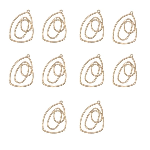 Close-up of ten gold-plated KC metal alloy layered oval pendants for DIY jewelry making