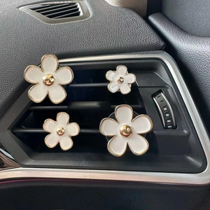 Daisy shaped car vent perfume clips with white enamel flower design set of four