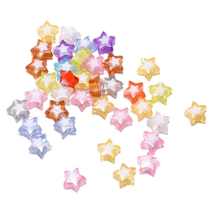 Macro shot of colorful acrylic star beads with white inner cores for DIY jewelry making