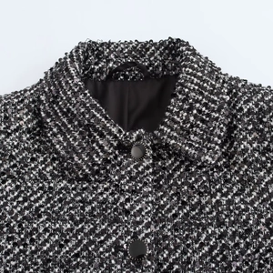 Women's chic sequined tweed jacket in black and white with metal decorative buttons