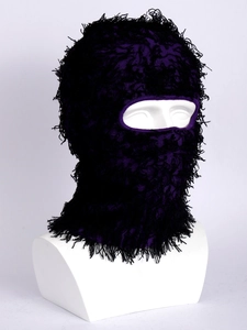 Close-up of the long-pile faux fur texture and knit details of a purple balaclava hood