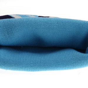 Detail of blue camouflage knit hat showing the soft ribbed texture and premium stitching