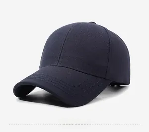 Close-up of dark blue twill baseball cap with metallic Narason logo on the side