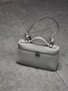 Minimalist light grey lychee leather handbag with top handle and silver hardware