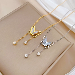 Titanium steel butterfly necklace in gold and silver finish with white shell inlay