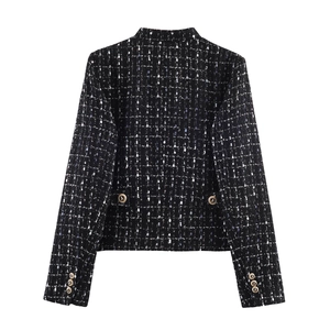 Back view of a black tweed jacket with metallic threads and gold button details