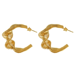 Detailed close-up of gold-plated coiled wire texture on spiral spring hoop earrings