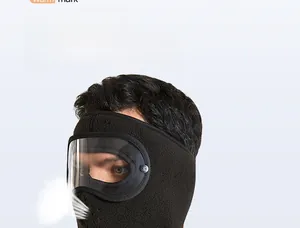 Detailed close-up of winter fleece balaclava showing 18 ventilation holes and anti-fog goggles