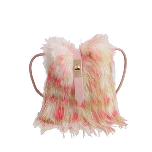 Tie-dye plush crossbody bag in pink and yellow fur with golden metal clasp