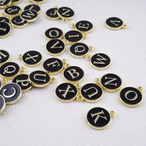 Assorted black enamel alphabet pendants in gold finish for DIY jewelry making
