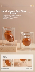 Detail of creative double-walled football shaped glass with high borosilicate material
