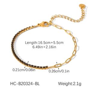 Detail view of gold stainless steel cross chain bracelet with black zircon and extension
