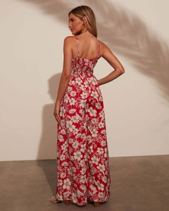 Detail of the back elastic ruched waist on red floral jumpsuit for vacation style