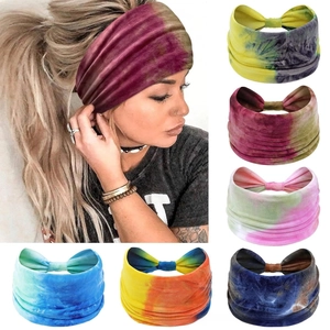 Detail of six tie-dye bohemian elastic headbands for yoga and sports wear in multiple colors