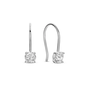 Macro detail of S925 sterling silver hoop earring featuring four-prong set round cubic zirconia